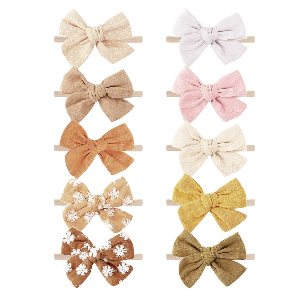 Set of colorful hair bows on white background
